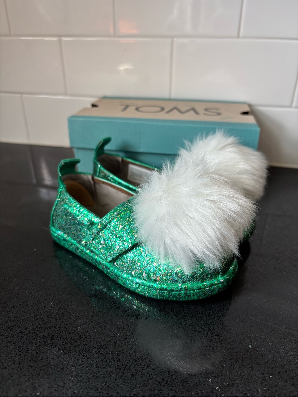 Toms Kids Green Glitter Slip-On Moccasins with White Pom